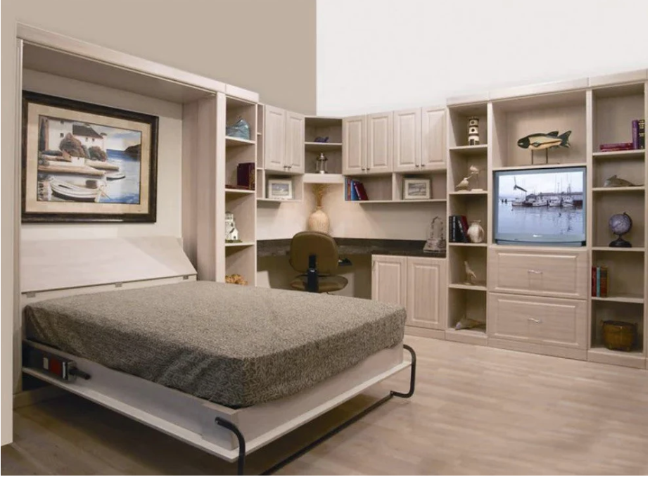 Queen sized wall bed and ample cabinetry.