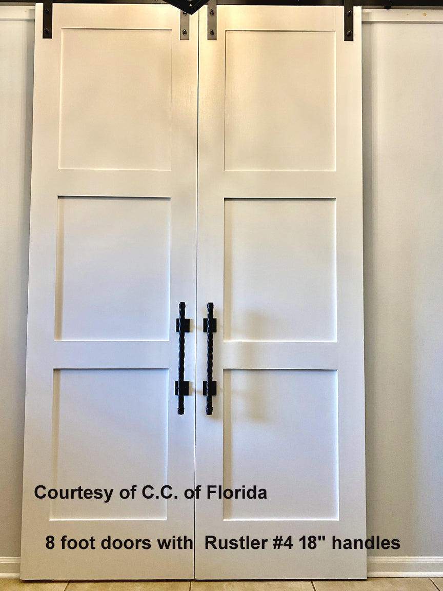 Rustler #4 rope style door pull on 8-foot barn doors, available in multiple sizes and finishes, sold individually.