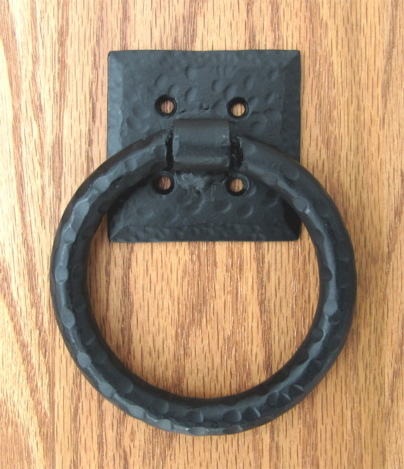Distressed 4-inch ring pull with hammered back plate, available in multiple finishes, sold individually.