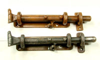 Heavy duty rustic surface slide bolts with eyelet for top or horizontal door use, sold individually in two finishes.