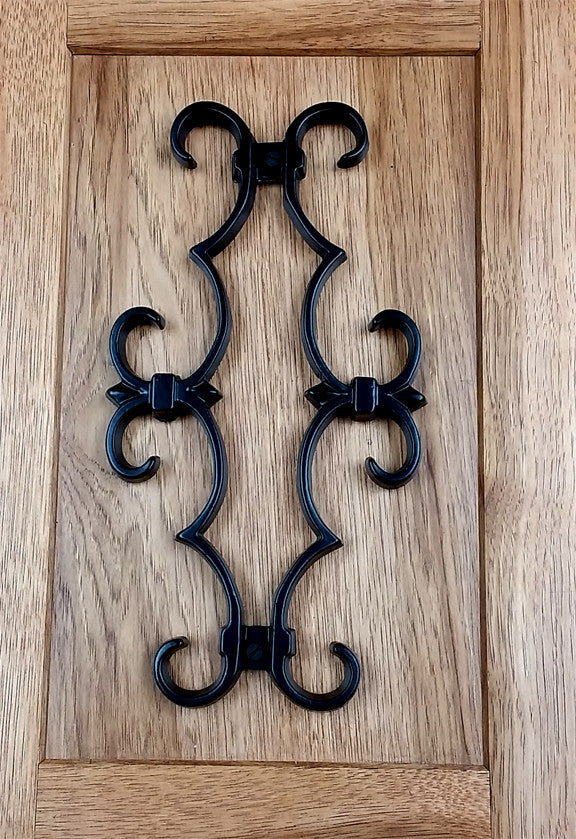 Decorative black scroll design grille for doors and gates, measuring 6-3/4" x 12-3/8", with a powder coat finish.