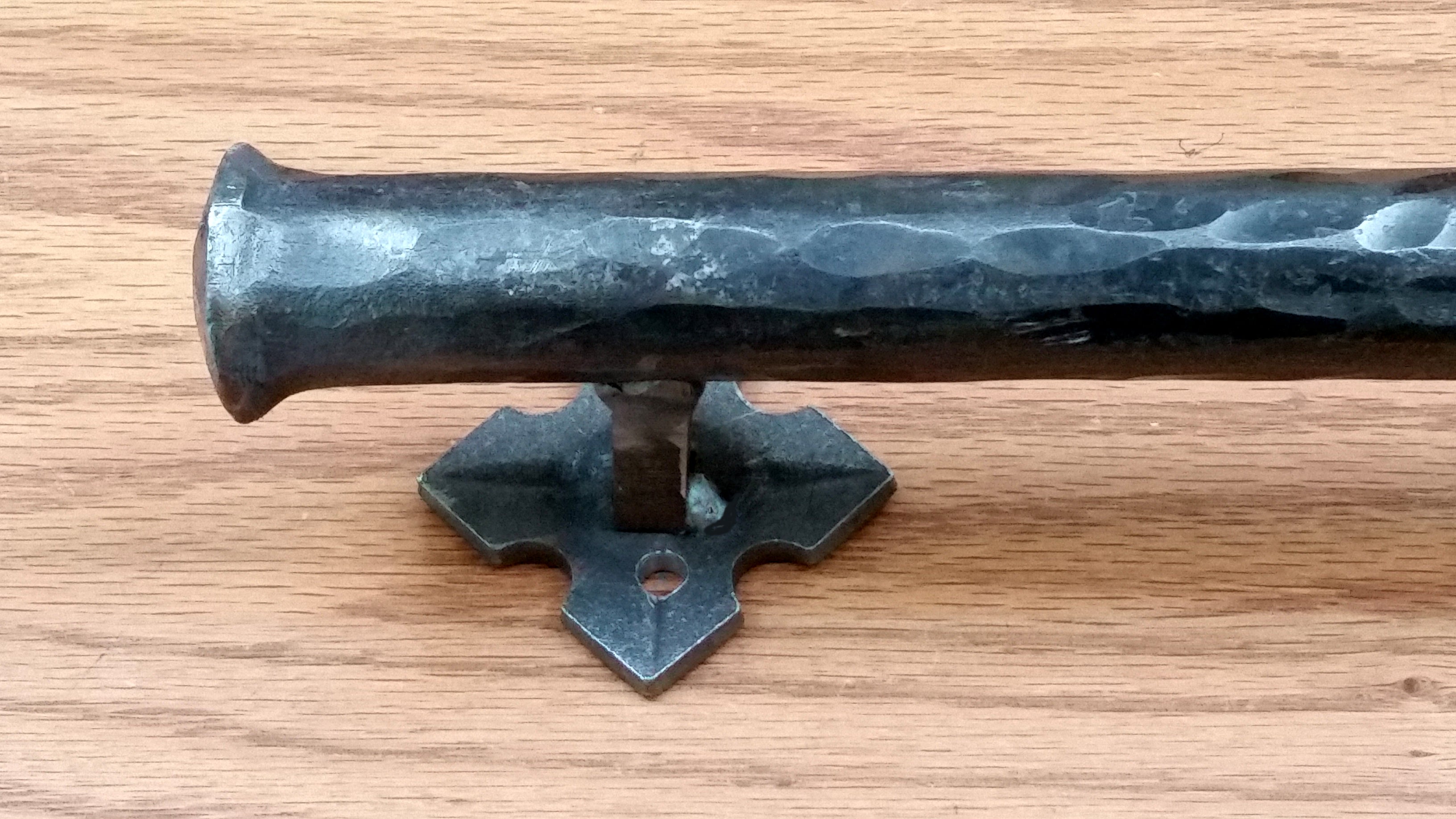 Round bar barn door handle with a distressed finish, 1-inch diameter, available in various sizes and finishes.