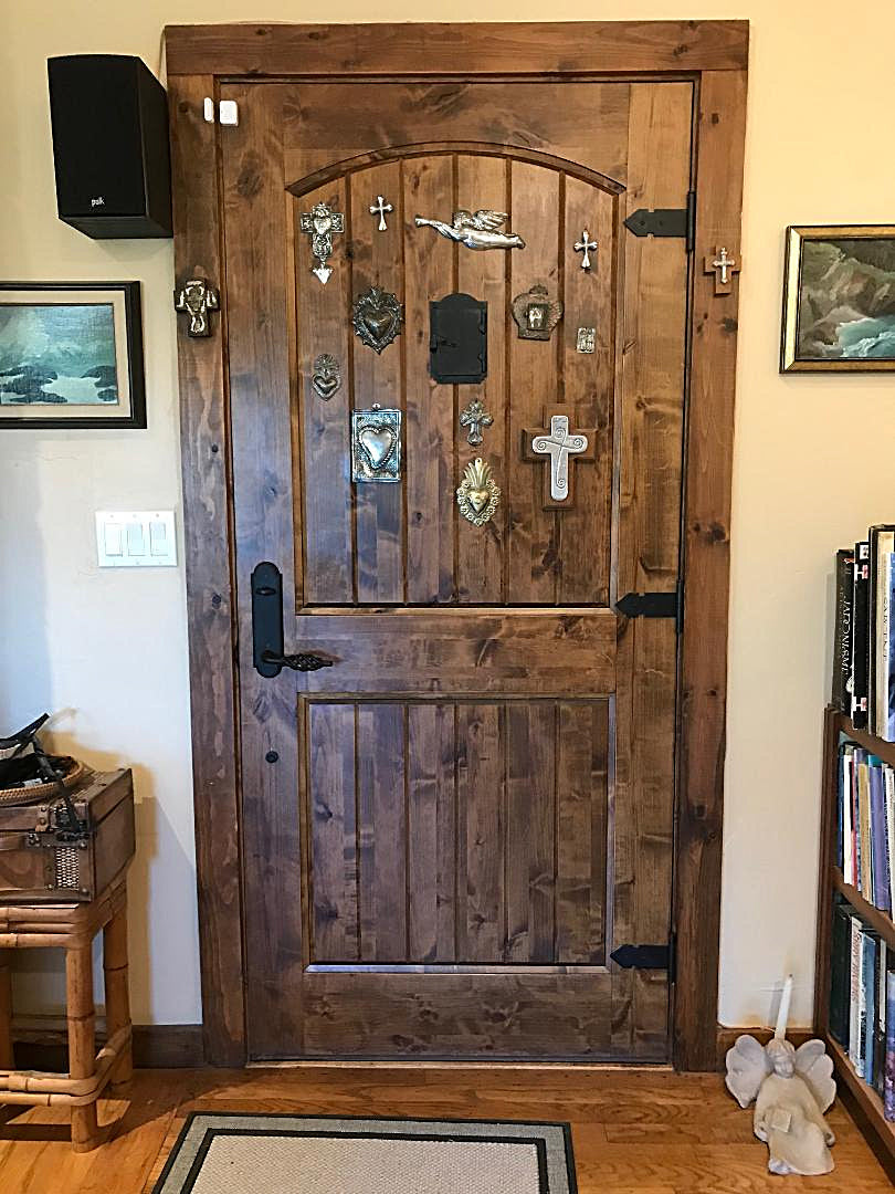 Peephole hinged iron door viewer in old hacienda style, 4.5 x 7 inches, ideal for enhancing door security.