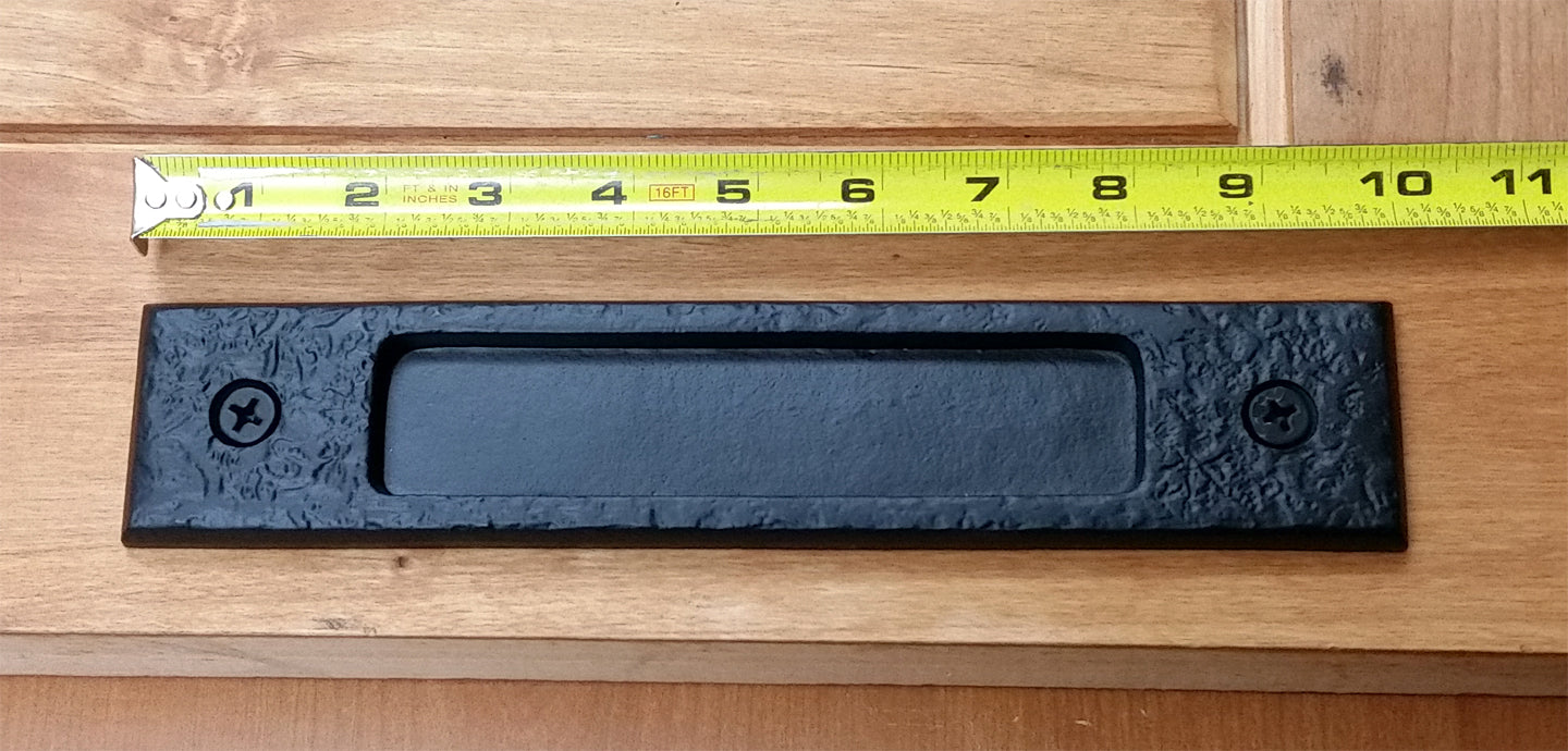 Large flush pull barn door handle with a distressed texture, measuring 10 inches, available in multiple finishes.