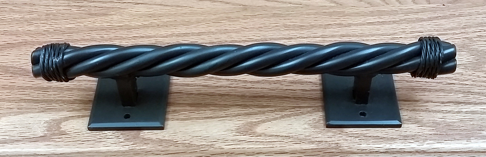 Rustler #4 rope style door pull with a twisted design, available in multiple sizes and finishes for barn doors.