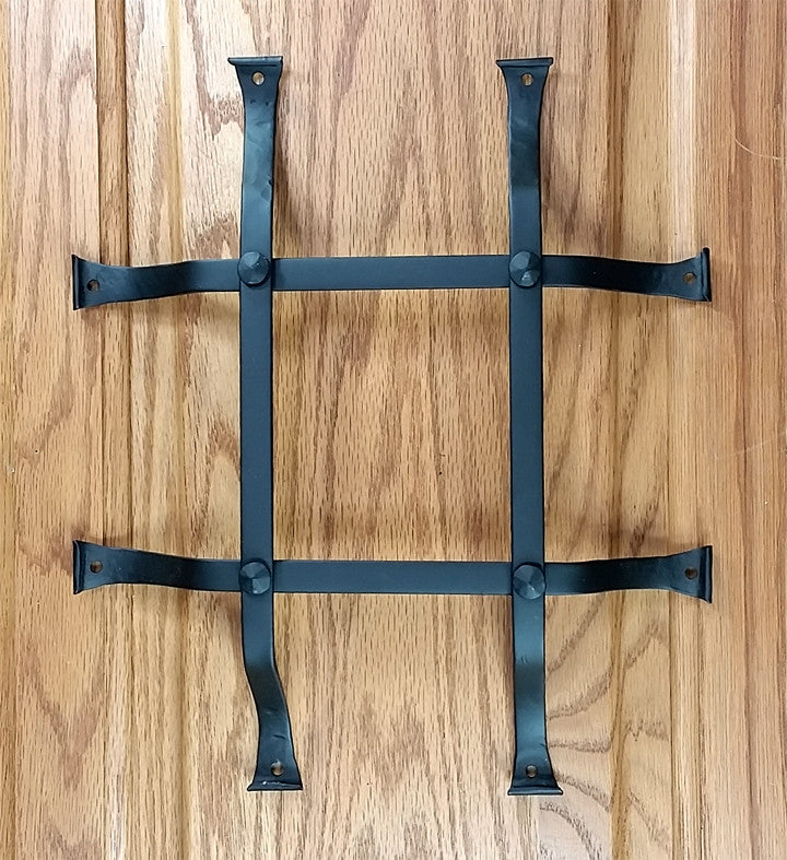 Standard curled tip door and gate grille in black powder coat finish, 10x12 inches with flared mounting legs.