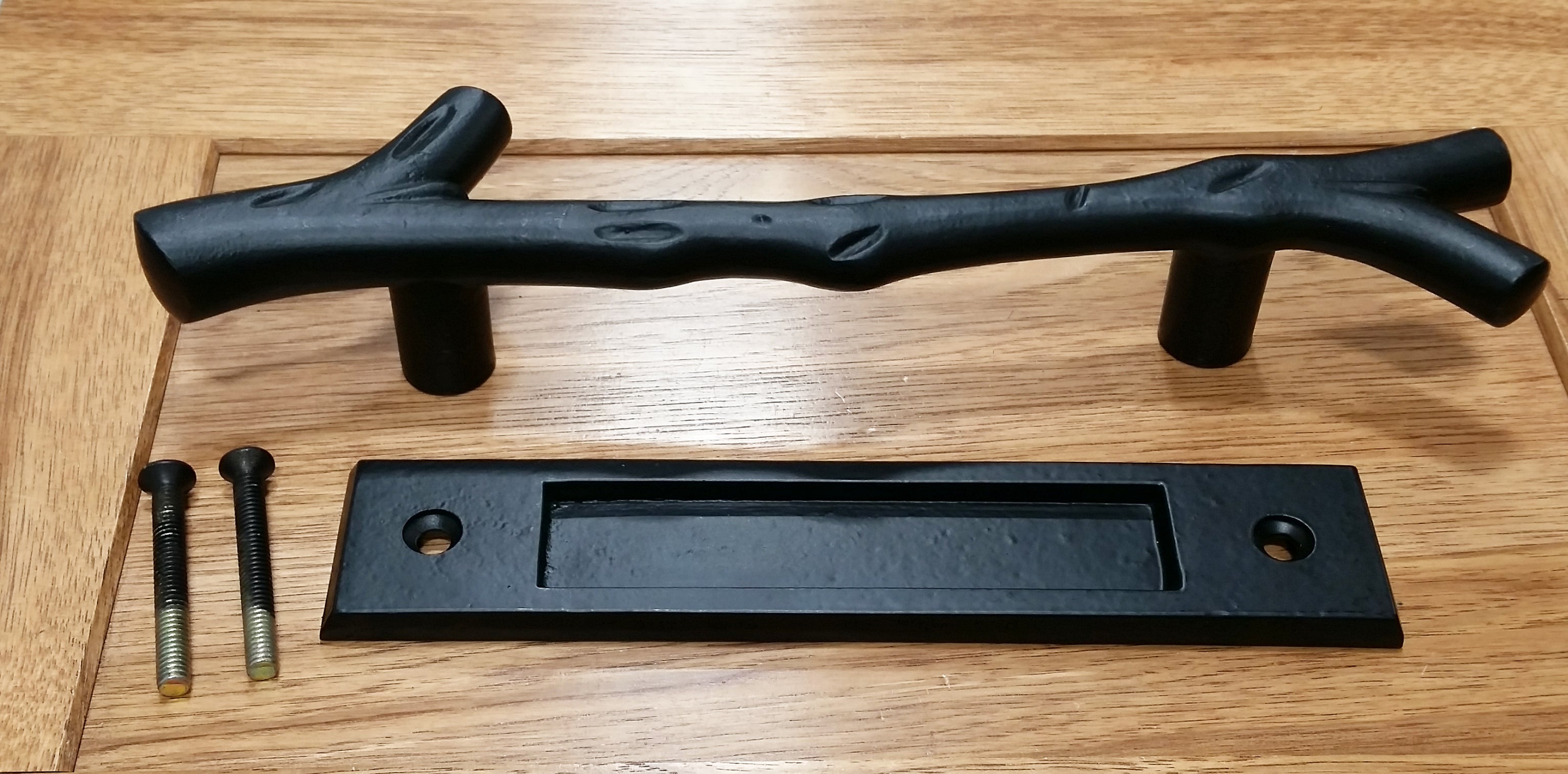 Large tree branch barn door handle with matching textured flush pull, available in multiple finishes, sold as a set.