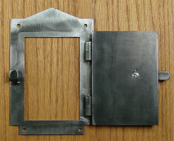 Craftsman style peephole hinged door viewer kit, measuring 4-1/2 inches by 7 inches, with a decorative grille design.