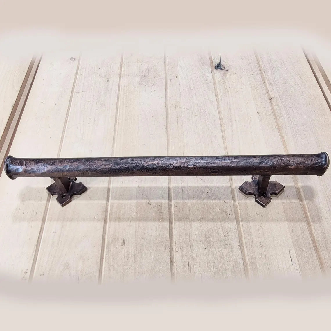 Round bar barn door handle with a distressed finish, 1-inch diameter, available in multiple sizes and finishes.