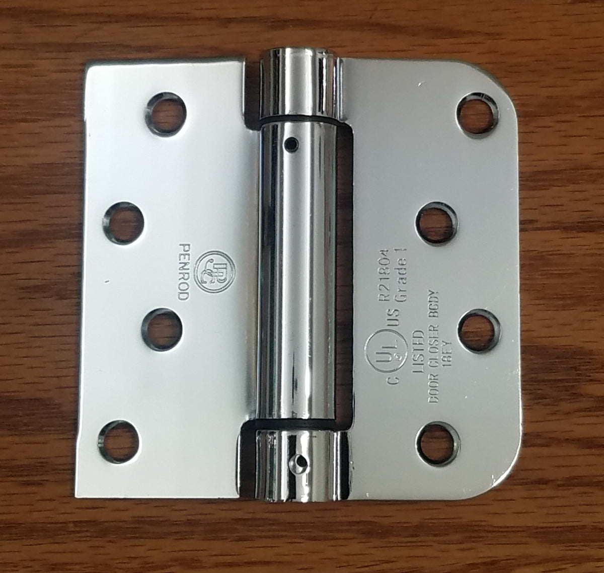 Polished chrome 4x4 spring hinge with square and 5/8" radius corners, designed for durability in a 2-pack.