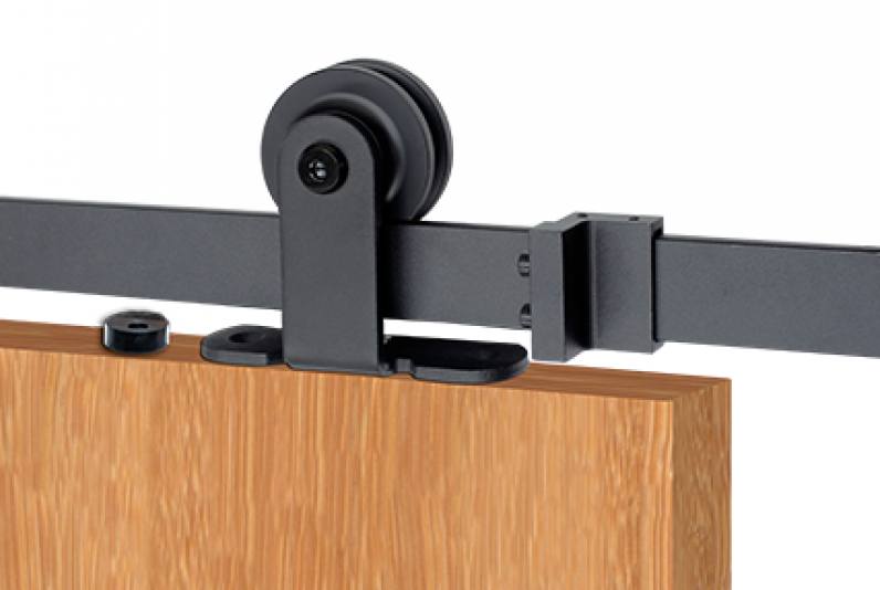 Top mount barn door hinge hardware kit with single wheel and soft close option, suitable for wood doors in various sizes and finishes.