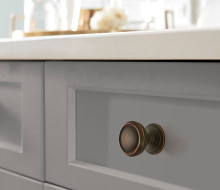 Revitalize Series cabinet knob in 1-1/4 inch size, available in multiple finishes, enhancing kitchen drawer aesthetics.
