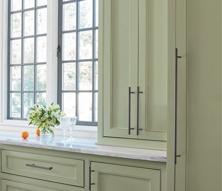 Sleek bar pulls for cabinets, 3-inch center to center, available in multiple finishes, enhancing modern kitchen design.