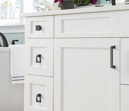 Blackrock Series cabinet pulls in black bronze finish, 3-3/4" center to center, enhancing modern kitchen cabinetry.