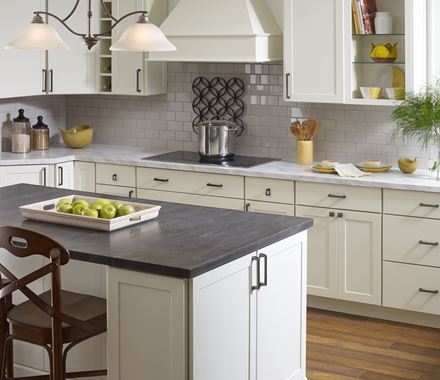 Blackrock Series cabinet pulls in black bronze finish, 3-3/4 inch center to center, enhancing modern kitchen design.