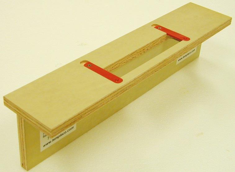 Single pocket clamp-on template kit with 18-inch template, two slotted brackets, and eight truss head screws.