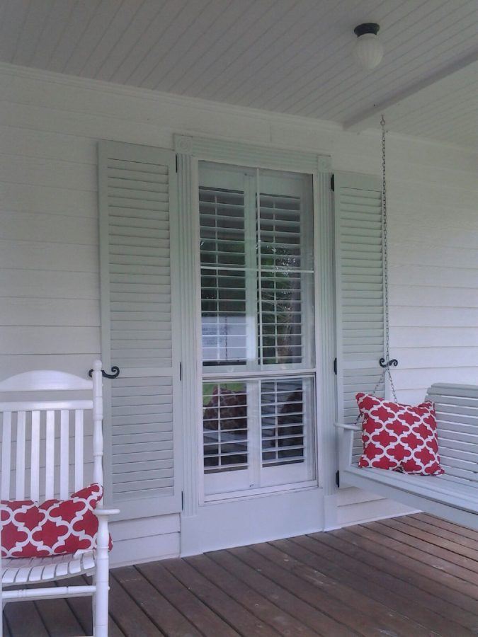 Faux shutter hinge in black powder-coated cast iron, 4-1/2" x 1", ideal for enhancing shutters and decor.