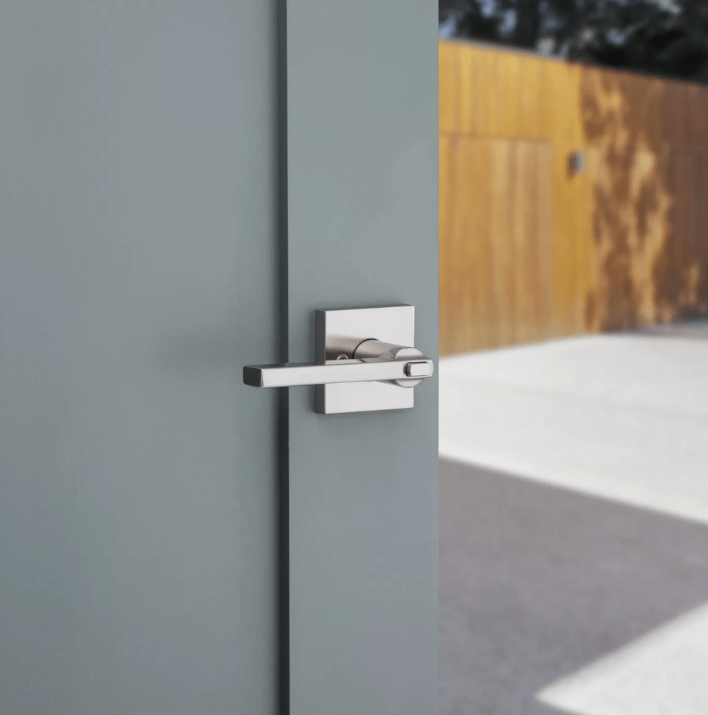 Kwikset Halifax square entry door lever in satin nickel finish with SmartKey security, designed for residential use.