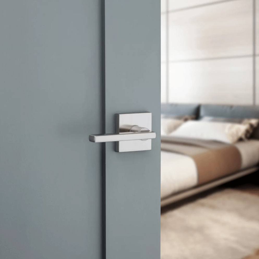 Satin nickel non-locking passage lever by Kwikset in Halifax square style for residential doors. Sold individually.