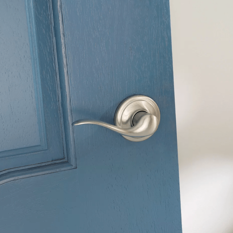 Satin nickel non-locking passage lever door handle in Tustin style with Microban antimicrobial protection.