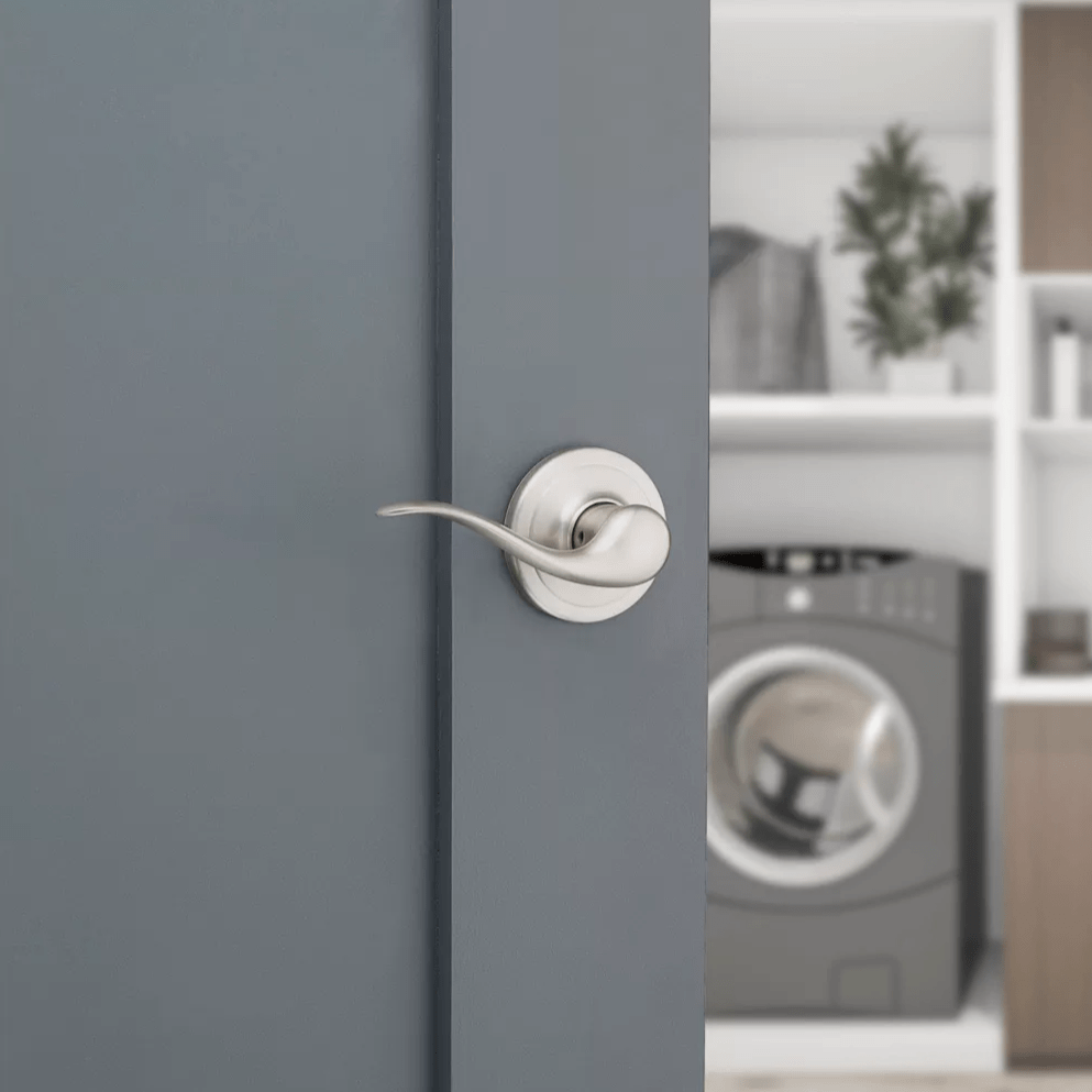 Satin nickel non-locking passage door lever in Tustin style with Microban antimicrobial protection, sold individually.