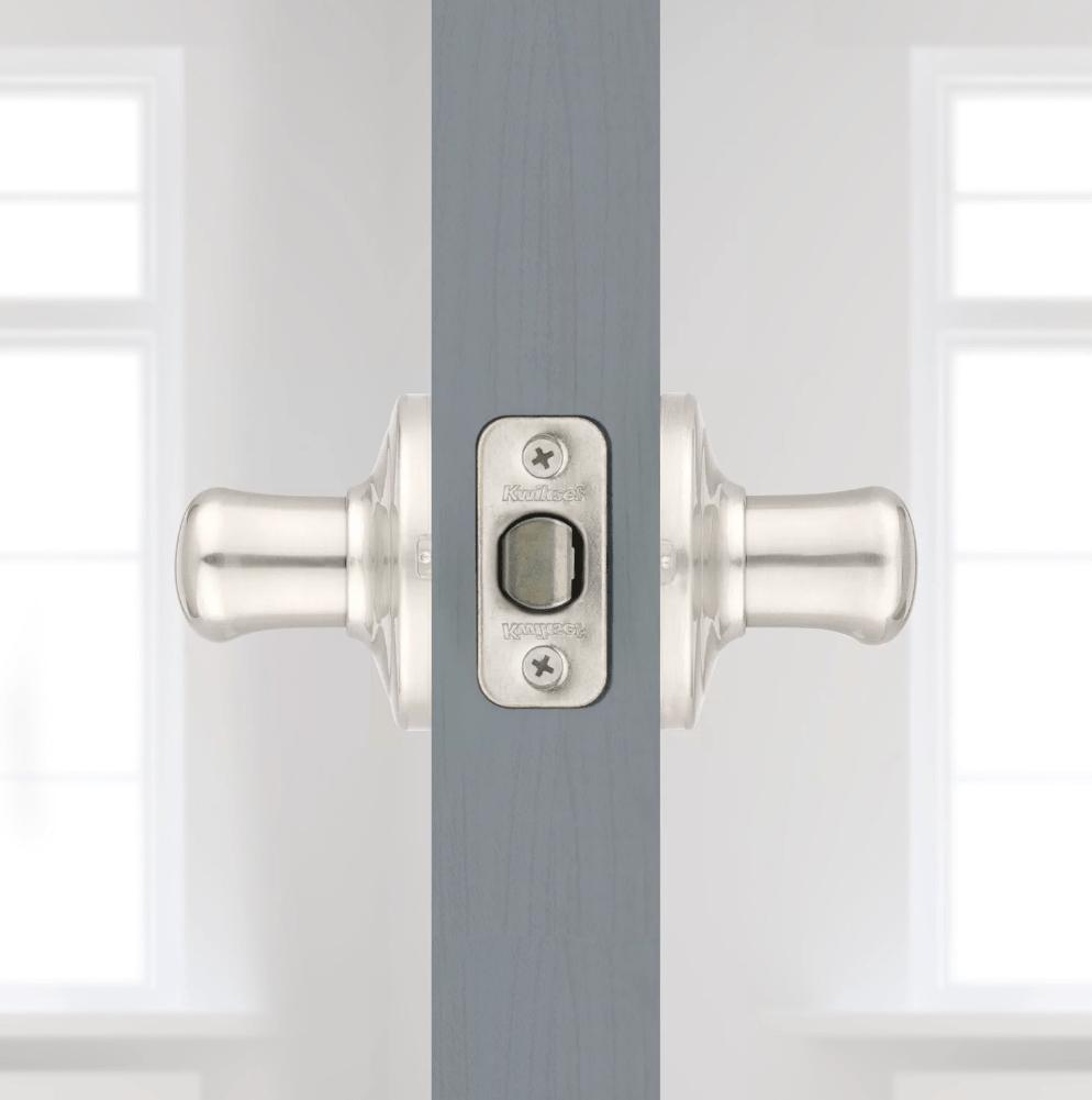 Satin nickel non-locking passage door lever in Tustin style with Microban antimicrobial protection, sold individually.