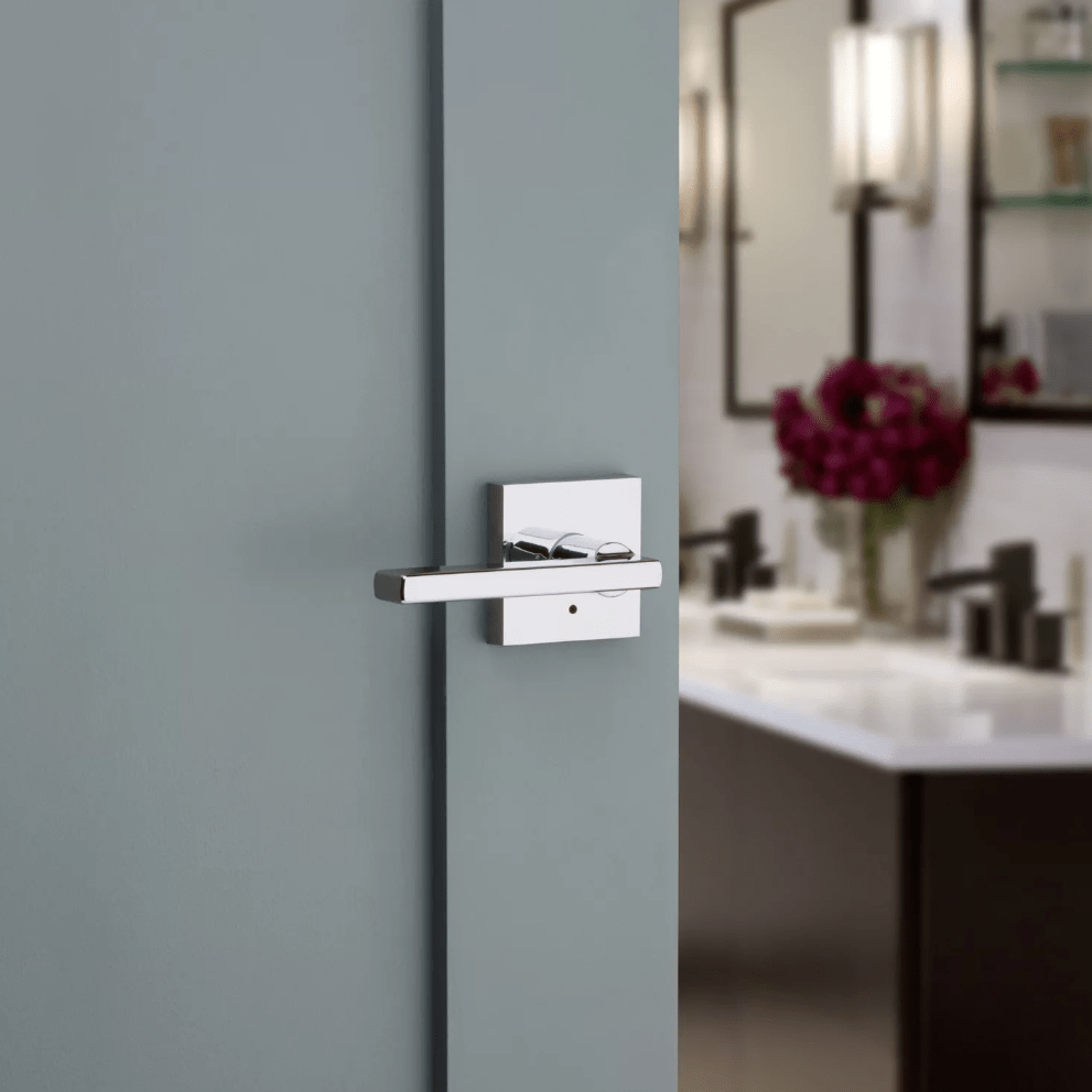 Kwikset Halifax square privacy door lever in bright polished chrome finish, designed for residential use.