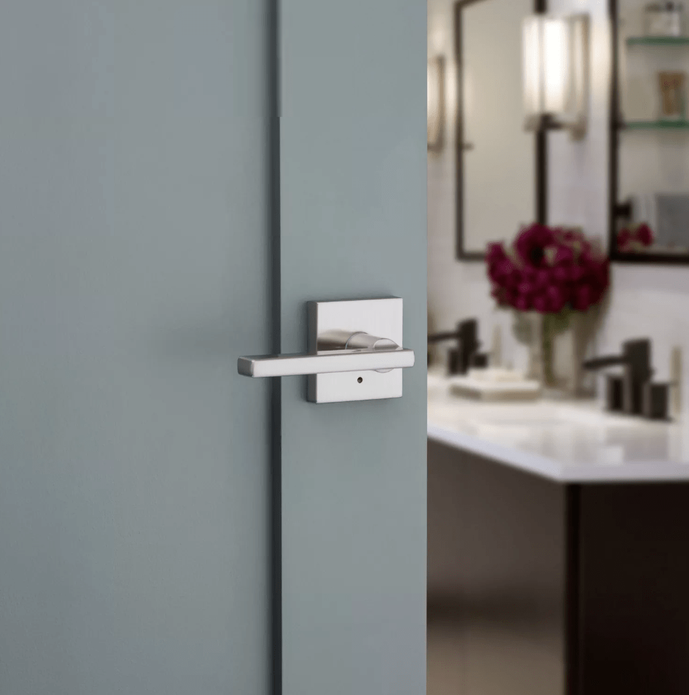 Kwikset Halifax square privacy door lever in satin nickel finish, ideal for residential use. Sold individually.