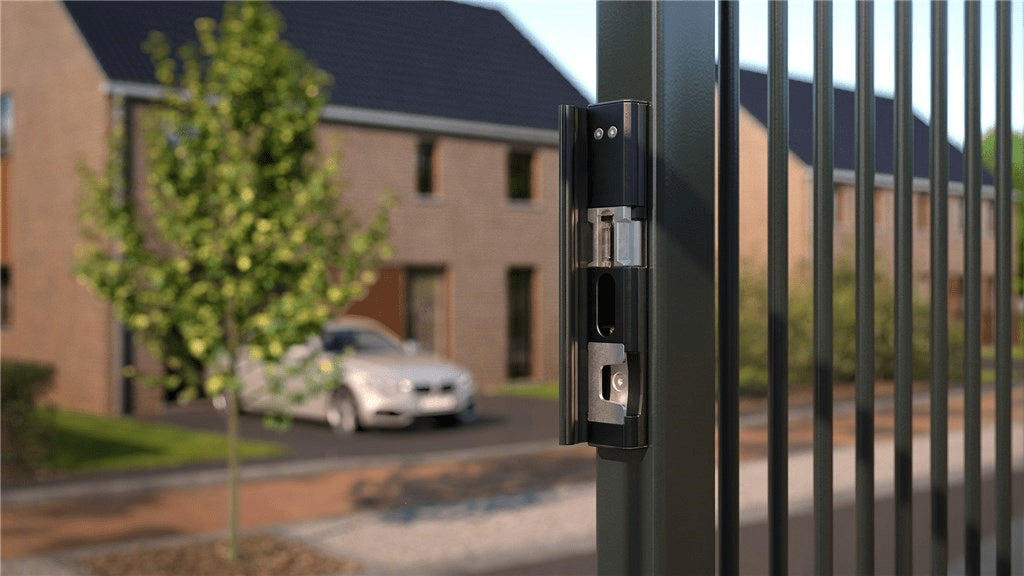 Surface mounted electric strike for gates with security mushroom module, available in multiple finishes for residential use.