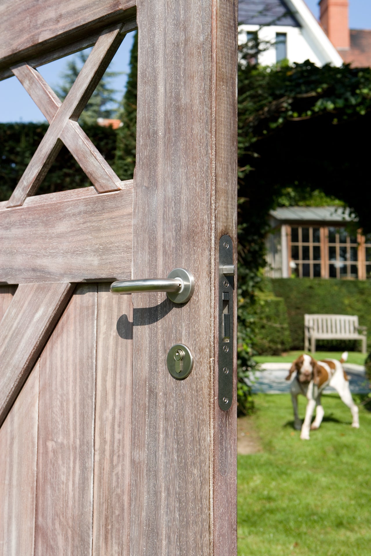 Mortise lock for wooden gates, featuring a sleek handle and keyhole, enhancing security and style.