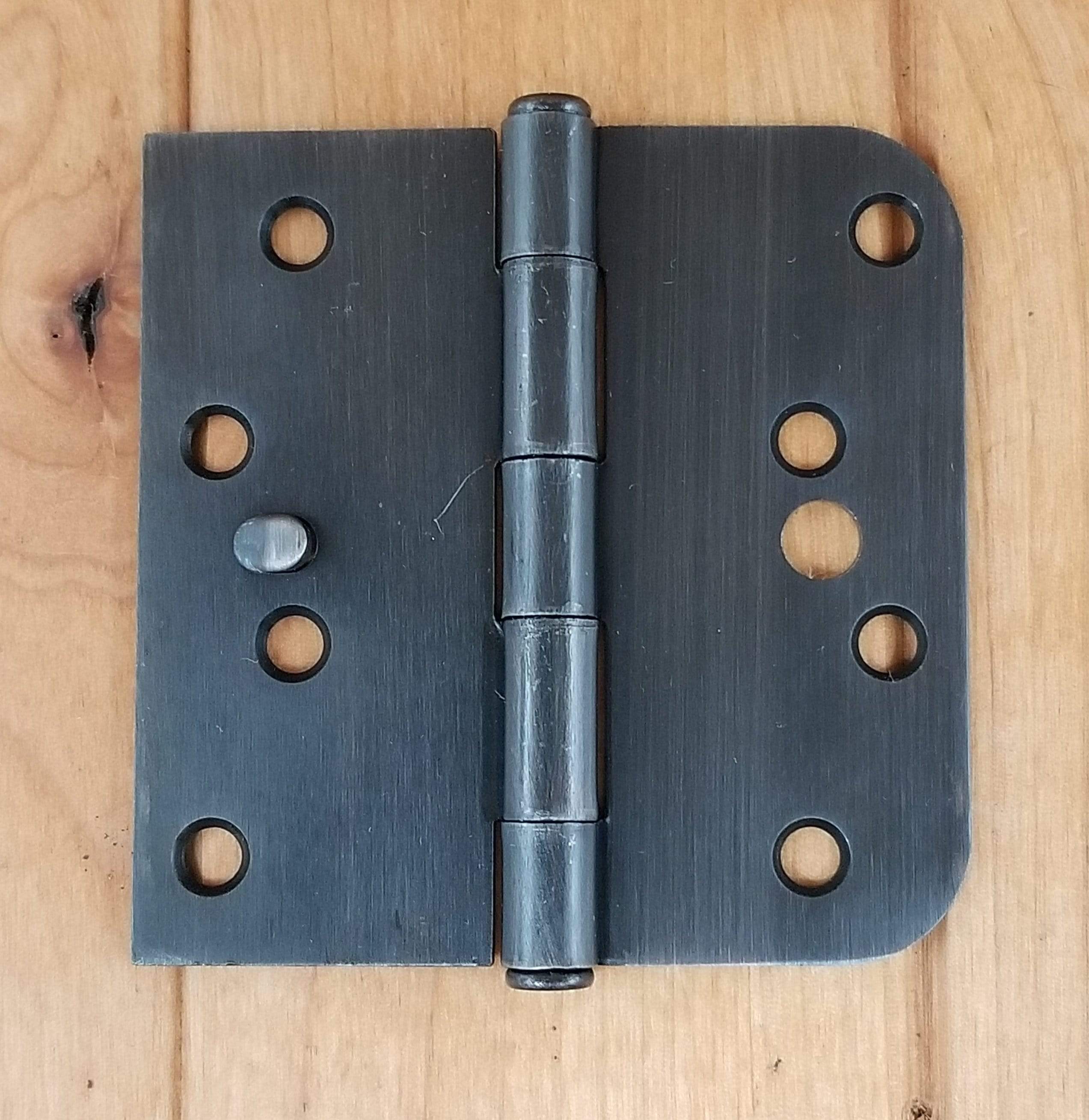 Security hinges, 4-inch with 5/8-inch square radius corners, available in multiple finishes, sold in a 2-pack.