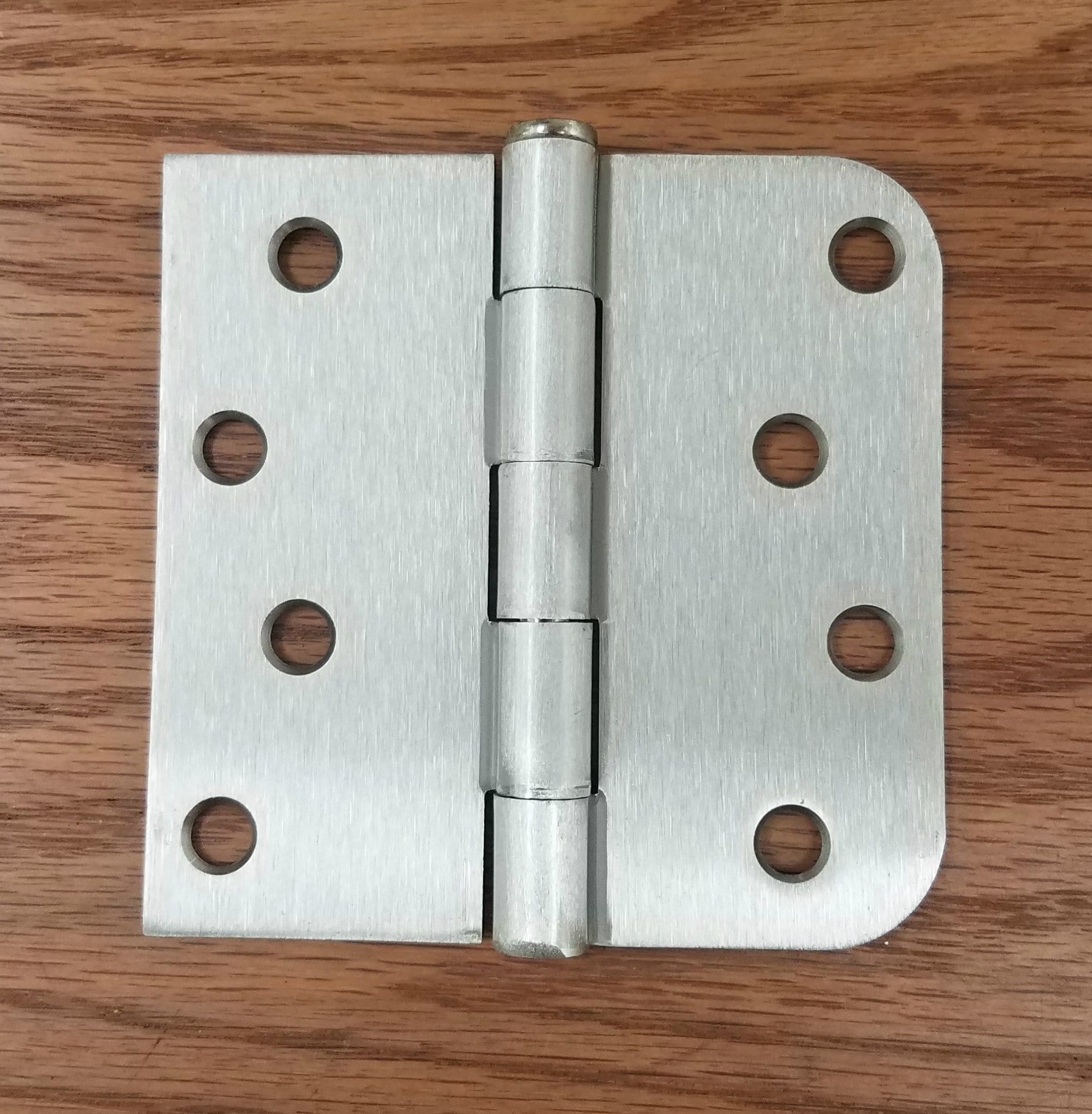 Satin nickel door hinge, 4 inches with 5/8 inch square, plain bearing, sold in a 2 pack for residential use.