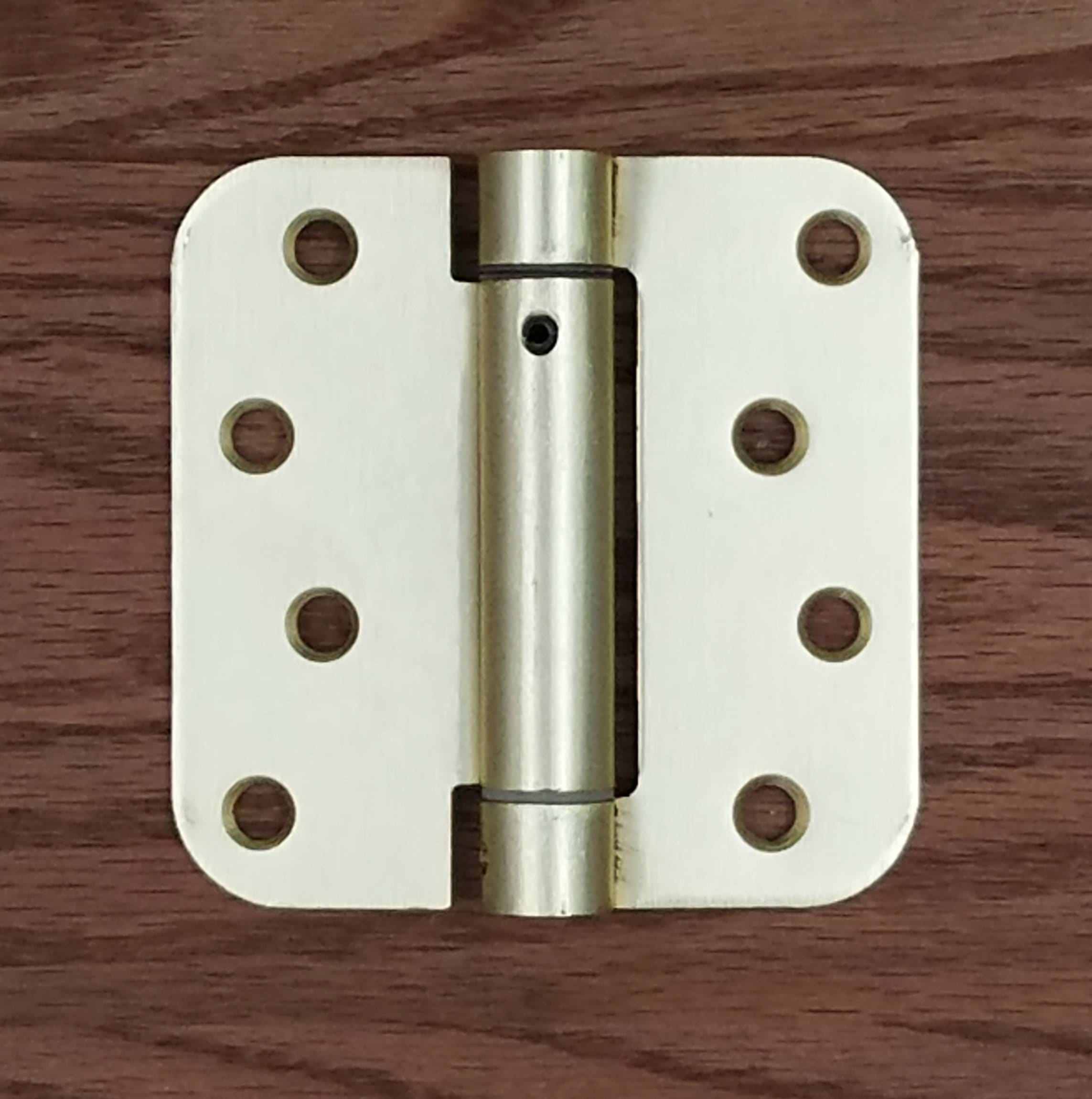 4x4 inch spring hinges with 5/8 inch radius corners in satin brass finish, sold in a 2 pack for doors.