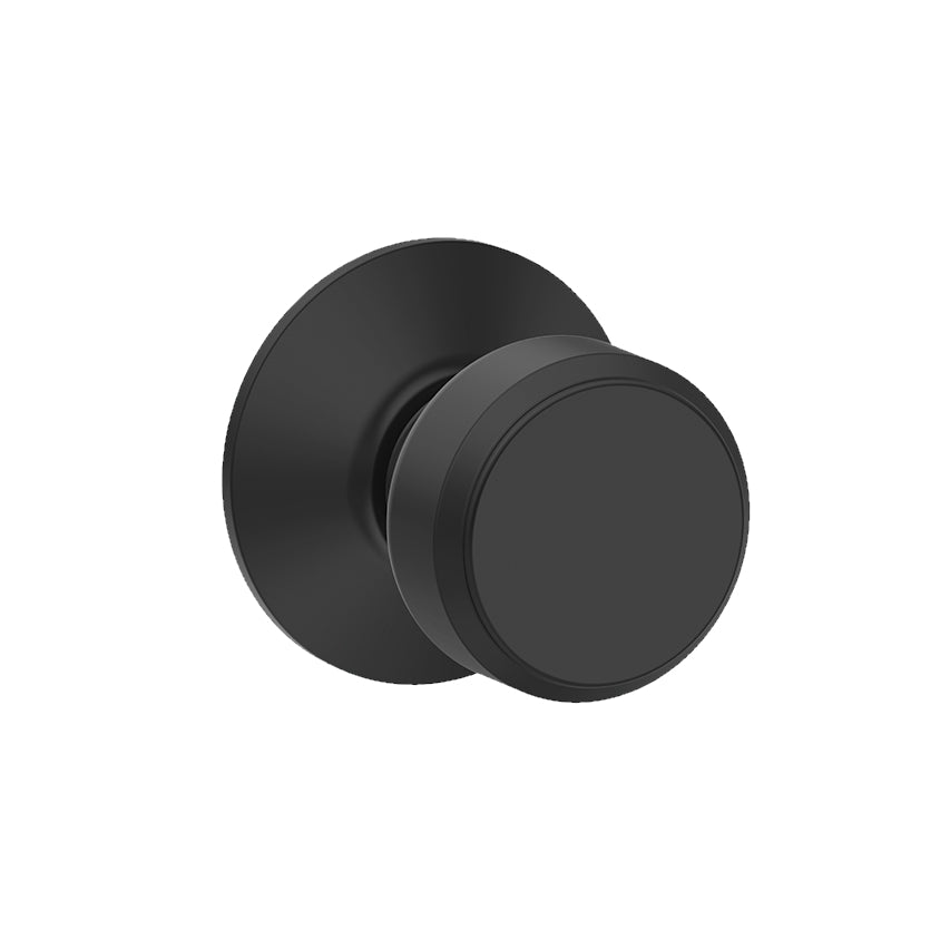 Matte black Schlage Bowery style non-locking passage door knob for residential use, sold individually.