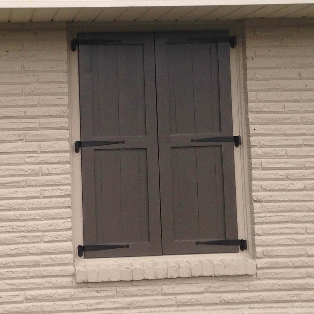 Black powder-coated strap hinge for shutters, 12 inches with circle tip, suitable for various offsets, sold individually.
