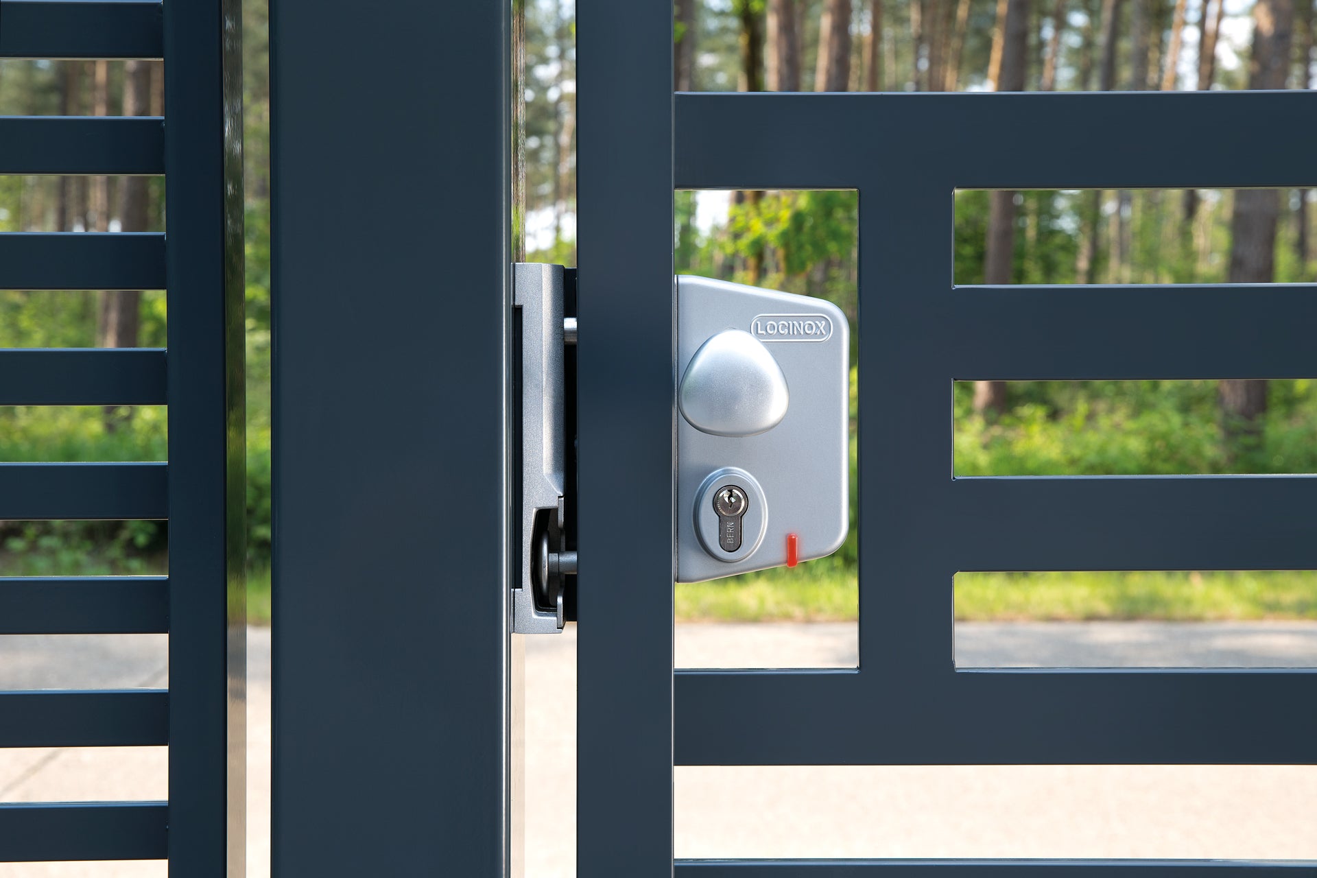 Surface mounted electric gate lock designed for square profiles, featuring fail open functionality and multiple finishes.