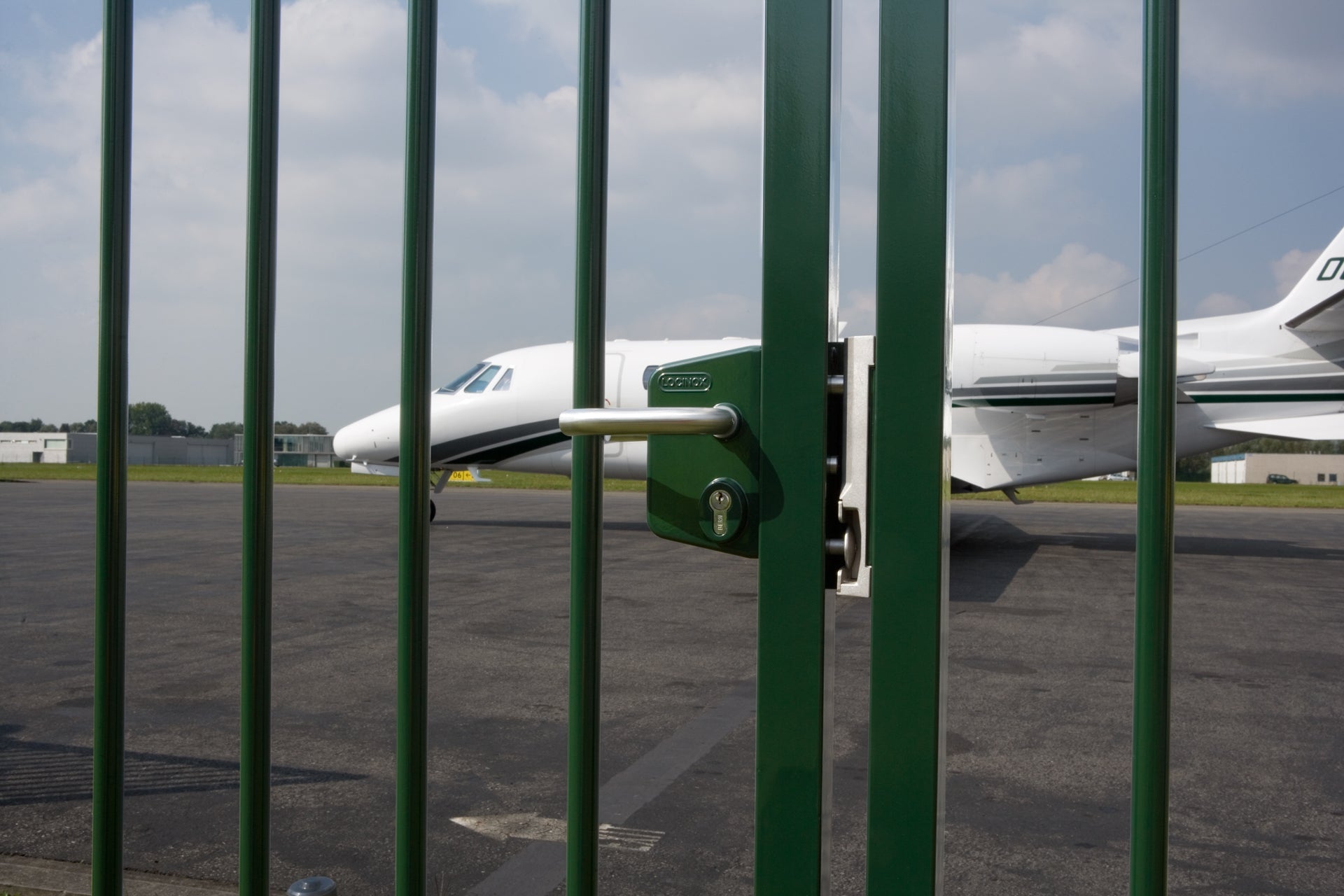 Surface mounted gate lock designed for square or flat profiles, compatible with 3/8" to 3" widths, available in multiple finishes.