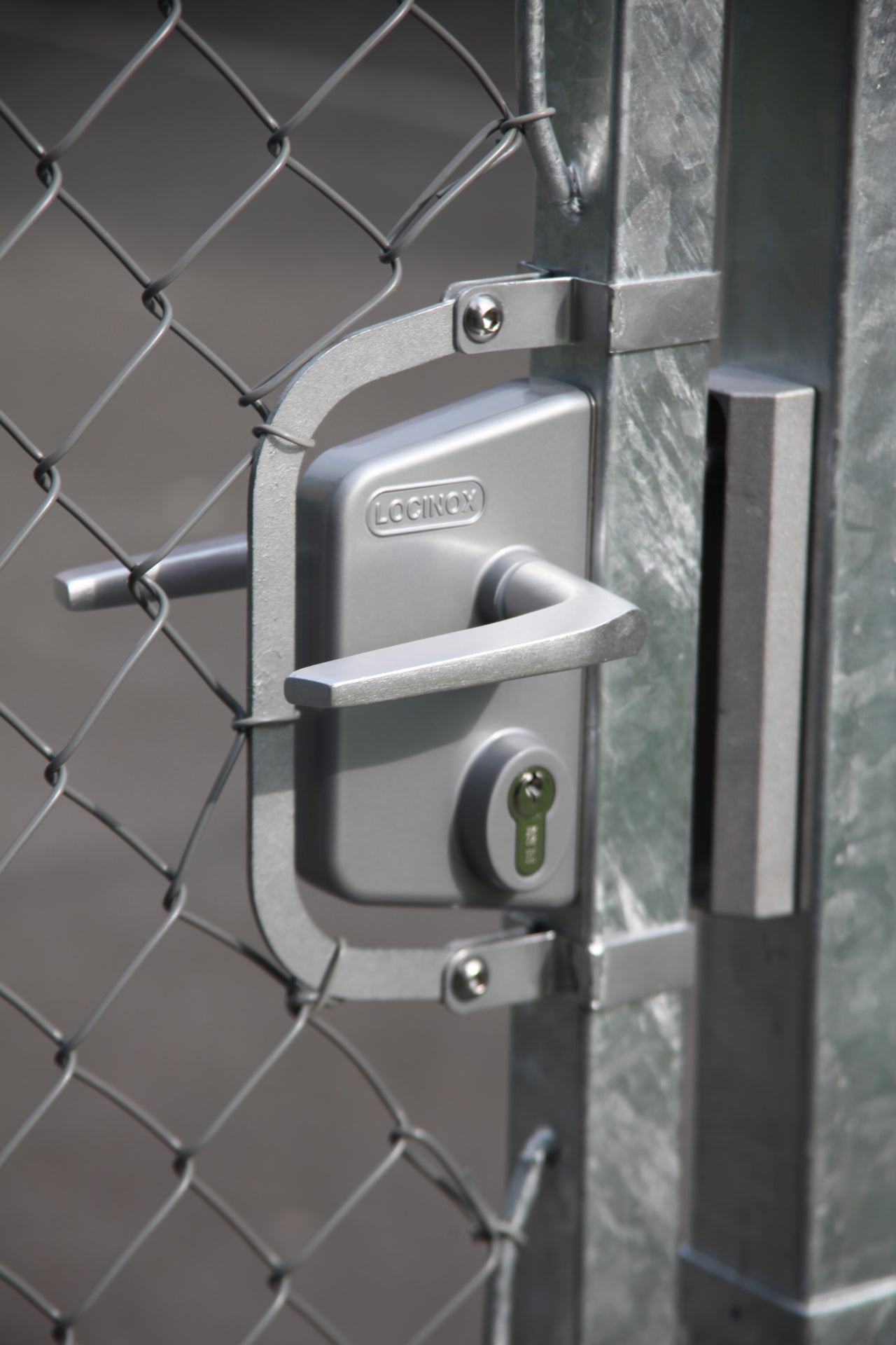 Surface mounted gate lock designed for square or flat profiles, suitable for 3/8" to 3" sizes, available in multiple finishes.