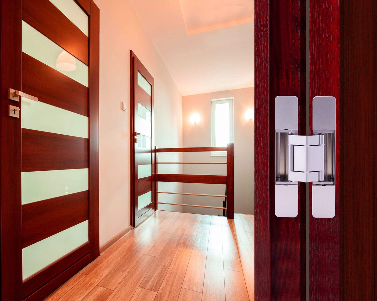 Three-way adjustable concealed hinge for cladded doors, available in multiple finishes, sold individually.