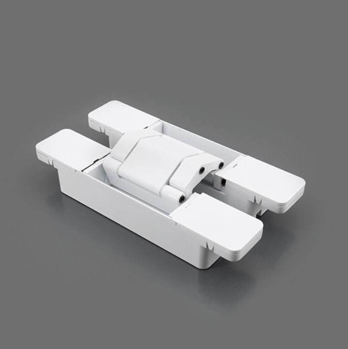 Three-way adjustable concealed hinge for cladded doors, available in multiple finishes, sold individually.