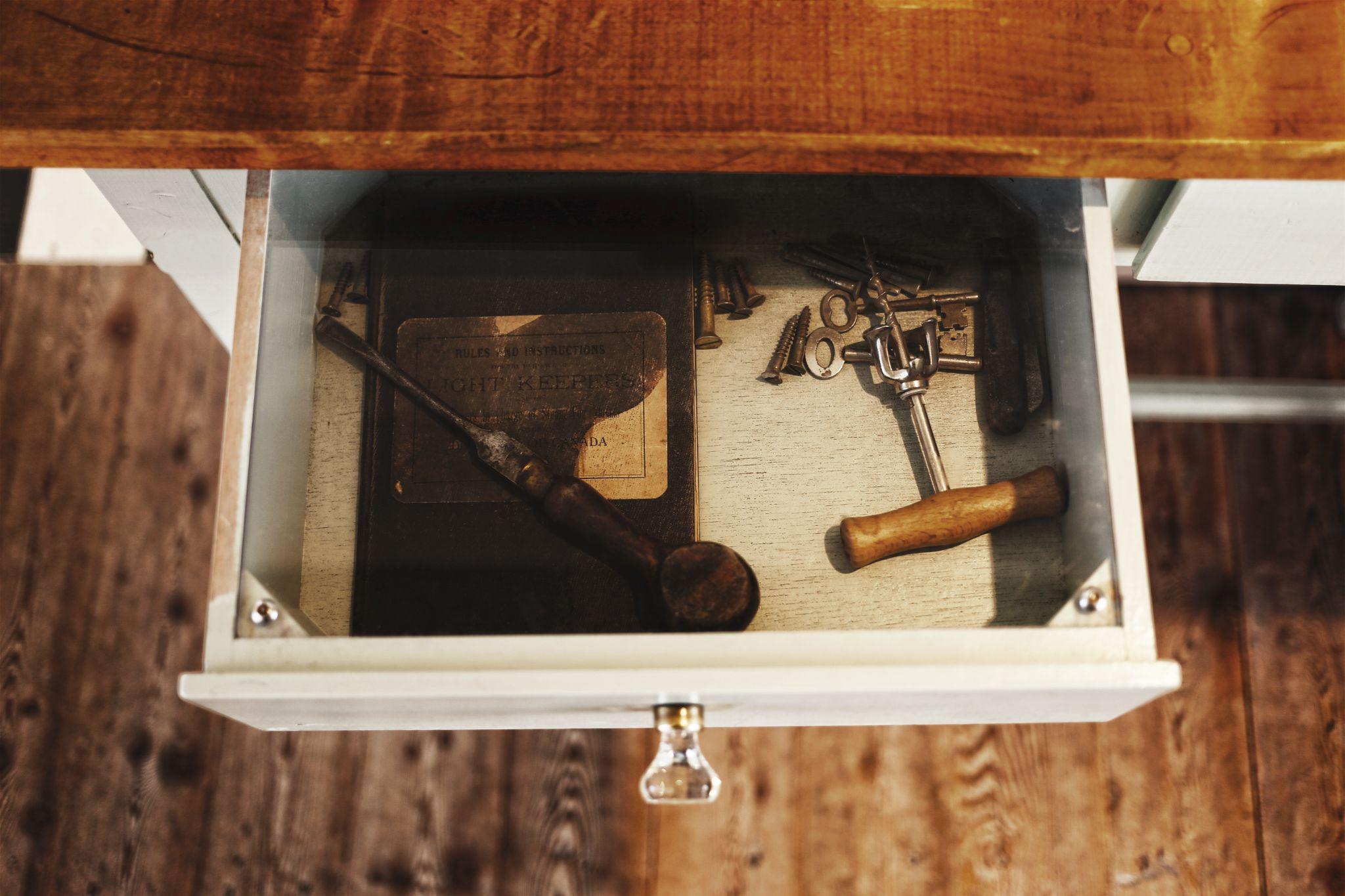 Drawer slides typically feature a cabinet member and a drawer member.
