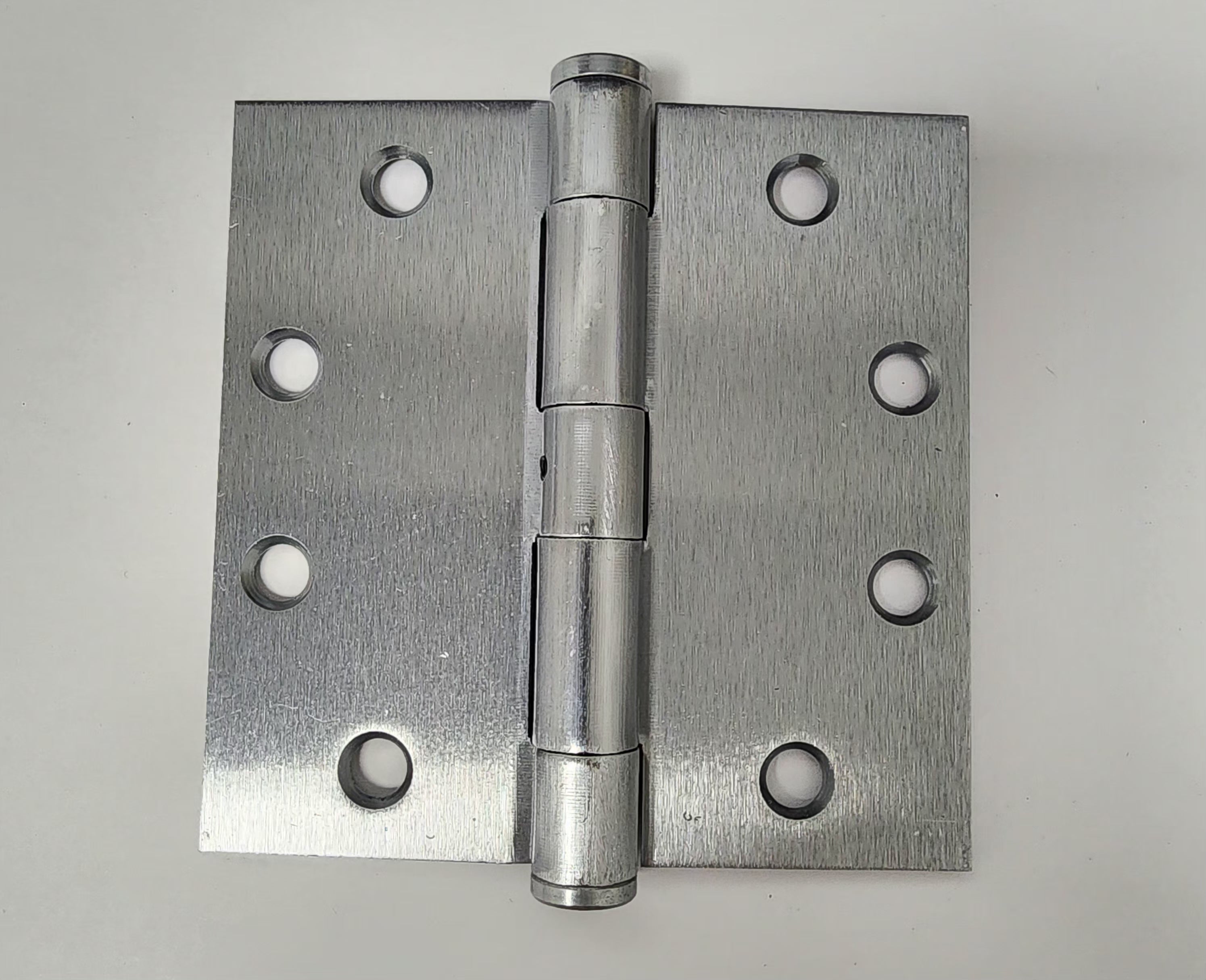 Commercial plain bearing hinges 4 1/2 inches square in multiple finishes, sold in a two-pack for versatile use.
