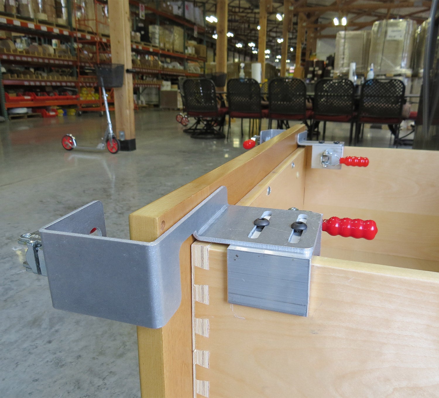 Drawer front clamps sold in pairs, designed for secure attachment during assembly in woodworking projects.
