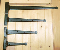 Premium colonial style strap hinges in various sizes, ideal for doors and gates, showcasing a classic design.