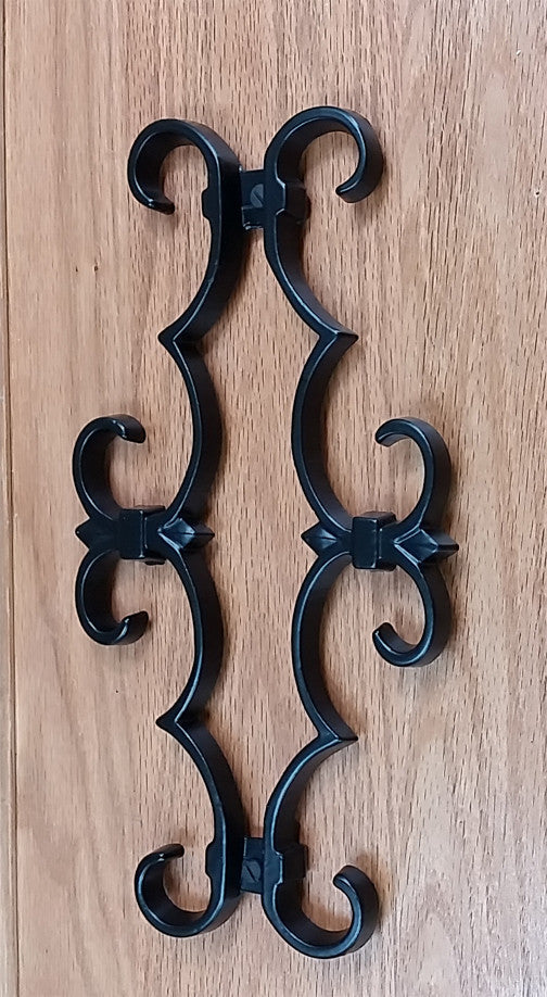 Decorative black scroll design grille for doors and gates, measuring 6-3/4" x 12-3/8", sold individually.
