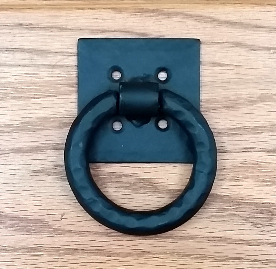 Hammered 3-inch ring pull with distressed finish and back plate, ideal for cabinets or doors. Sold individually.