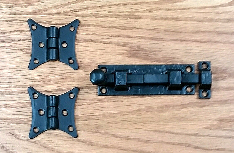 Black powder coat door and gate grille mounting kit set including two hinges and a latch for secure installation.
