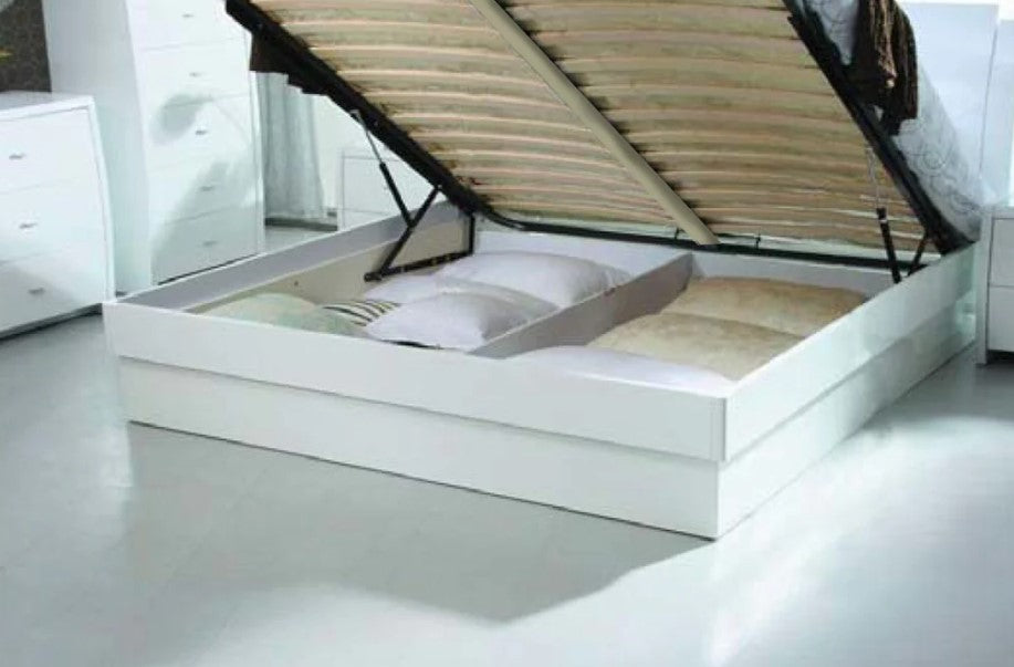 Hydraulic lift storage bed with frame and slats, offering under-bed storage in a sleek white design. Multiple sizes available.