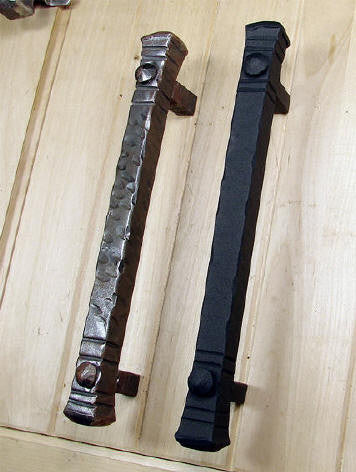 Jumbo bridge door pull handles in two finishes, designed for barn doors, measuring 13-1/2 inches long.