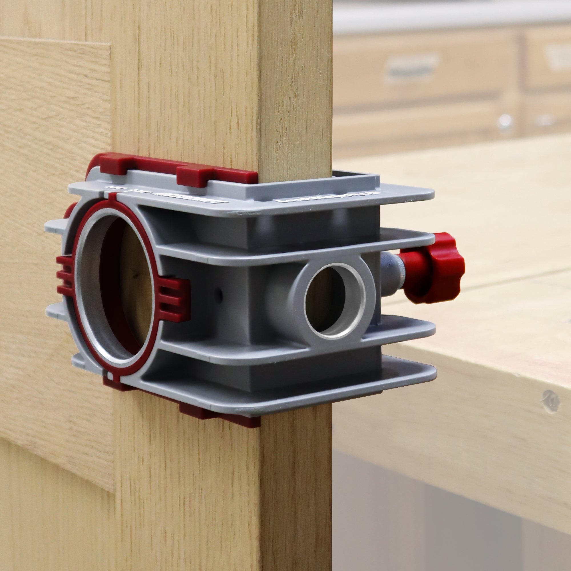 Self-clamping installation jig for precise lock and knob placement on doors, designed for professional use.